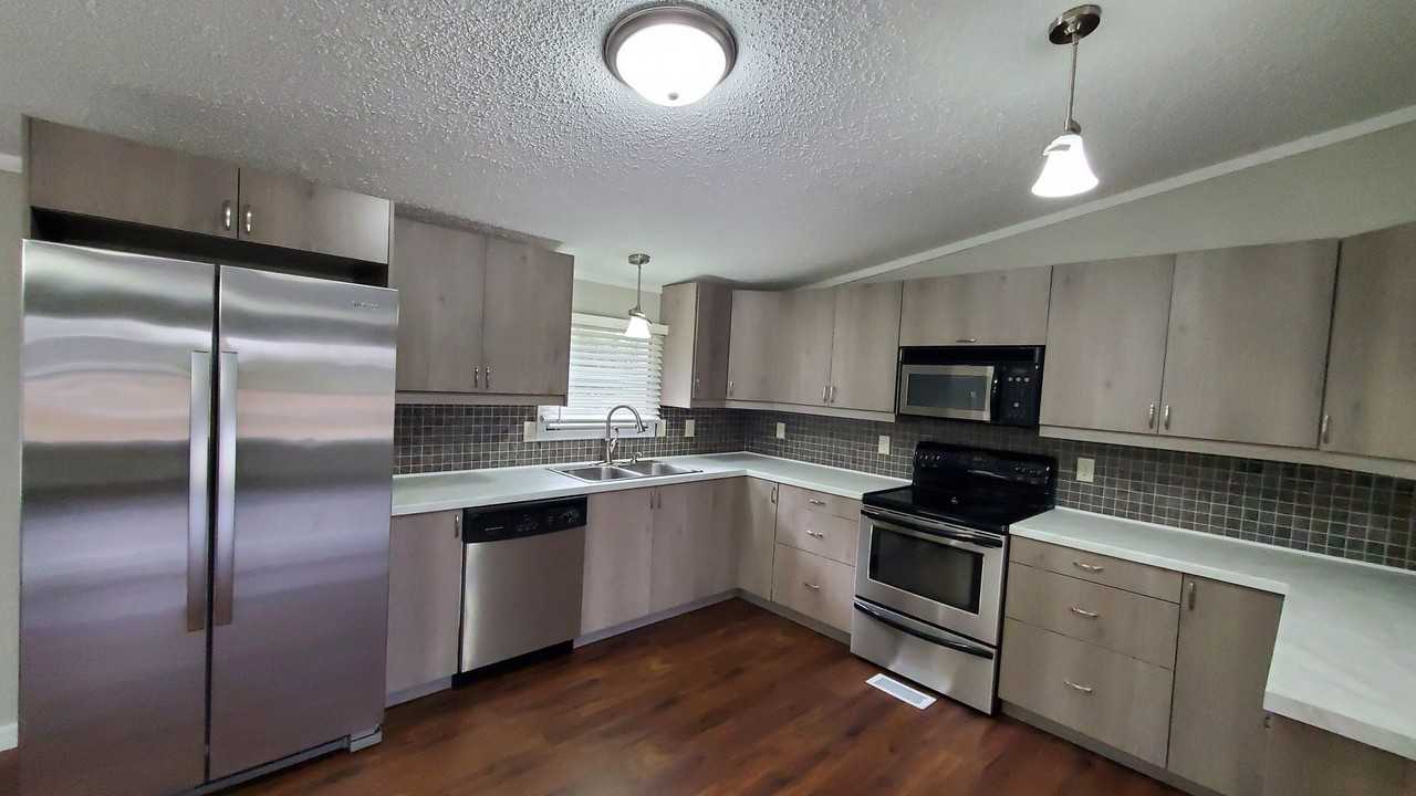 23 Andreasen Dr - Photo 2 of 26