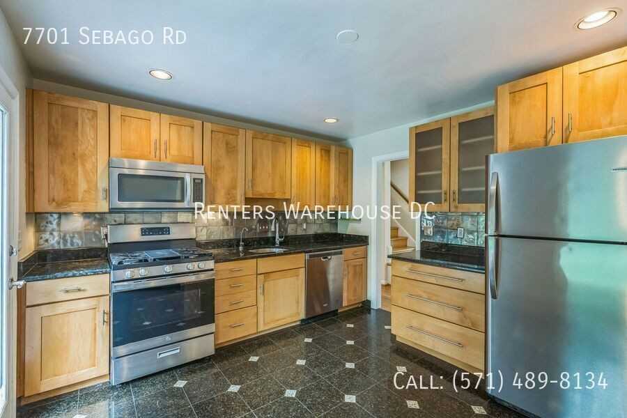 7701 Sebago Rd - Photo 6 of 29