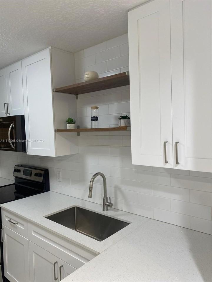 8411 Forest Hills Dr #105 - Photo 3 of 17