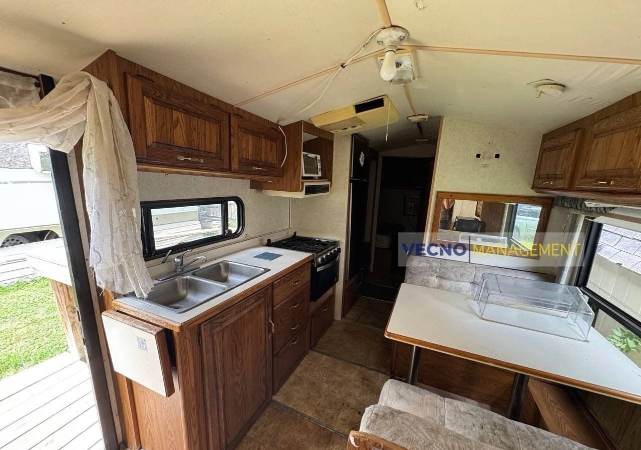 9831 Loop 106 #12B - Photo 5 of 9