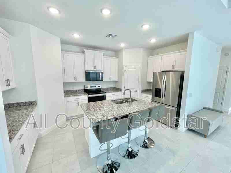 16901 Lazzo Dr - Photo 4 of 12