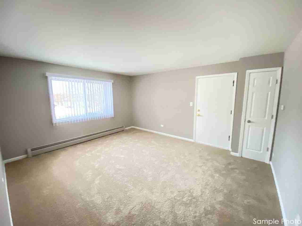 Carriage House Apartments LLC - Photo 2 of 44
