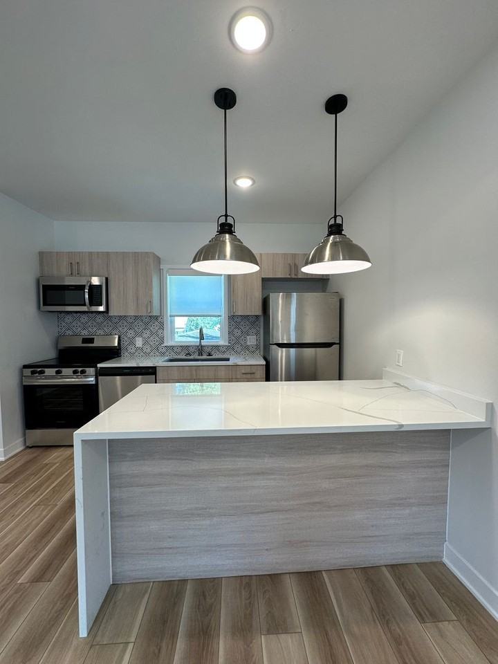 Foster Apartments - Photo 3 of 23