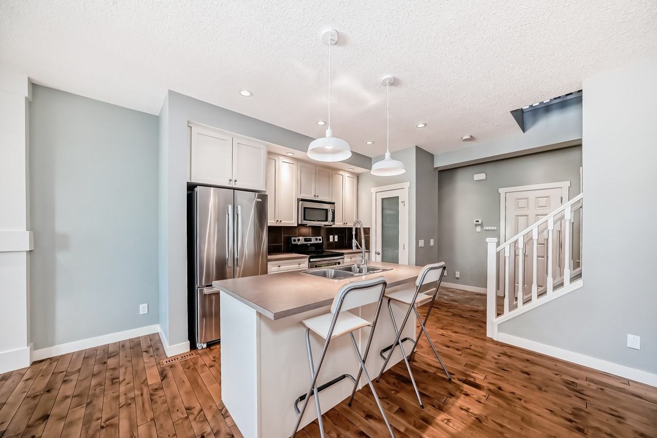 66 River Heights Cres Cochrane AB T4C 0J3 - Photo 2 of 6