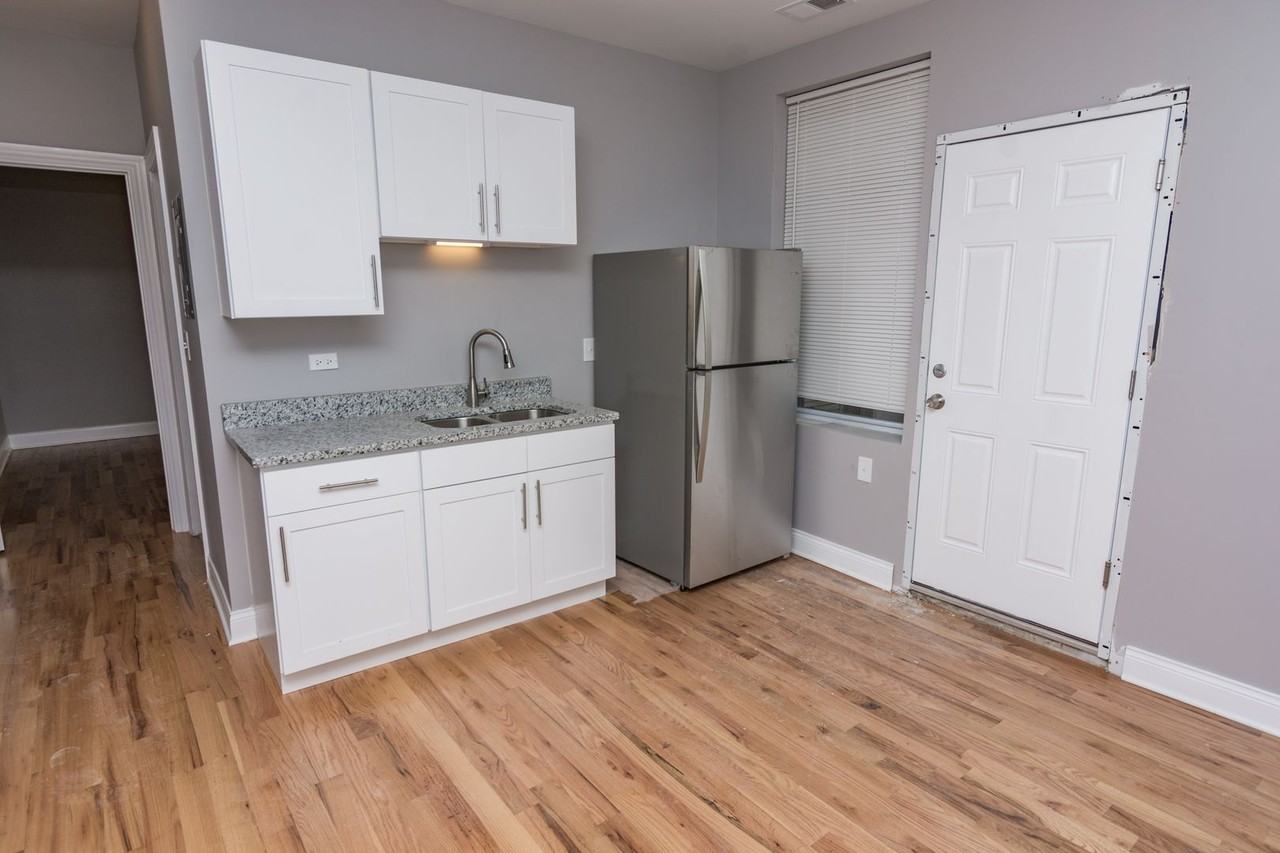 6055 S Peoria St - Photo 2 of 9