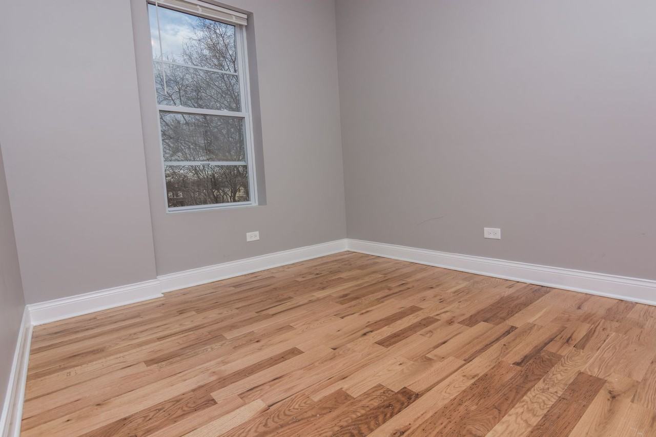 6055 S Peoria St - Photo 6 of 9