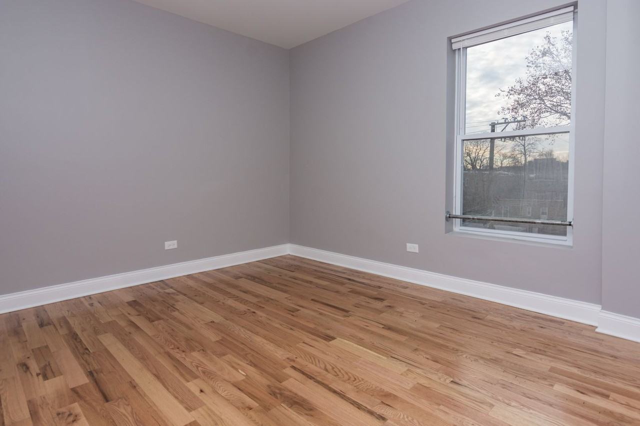 6055 S Peoria St - Photo 7 of 8