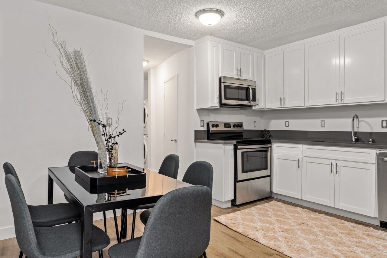 A 6 bedroom, 3 bathroom apartment with a dining/living room & a fully functional kitchen at 1700 Malcolm Unit 101 - Photo 2 of 10