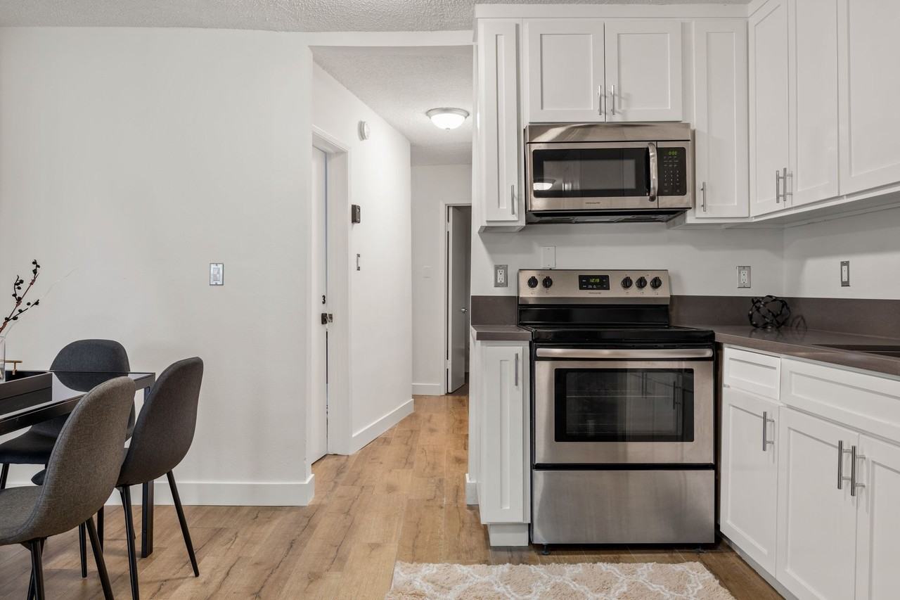 A 6 bedroom, 3 bathroom apartment with a dining/living room & a fully functional kitchen at 1700 Malcolm Unit 101 - Photo 5 of 10