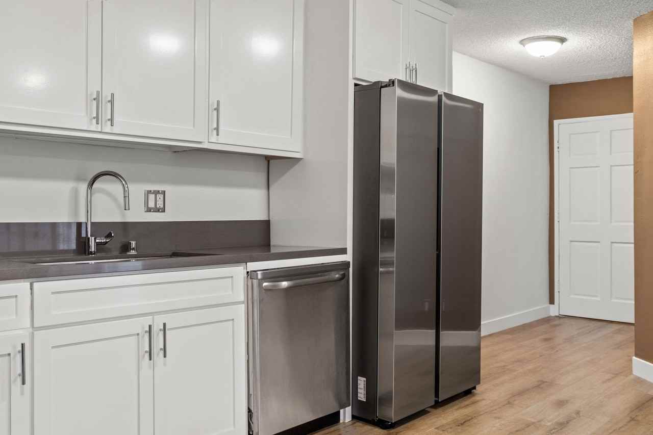 A 6 bedroom, 3 bathroom apartment with a dining/living room & a fully functional kitchen at 1700 Malcolm Unit 101 - Photo 7 of 10