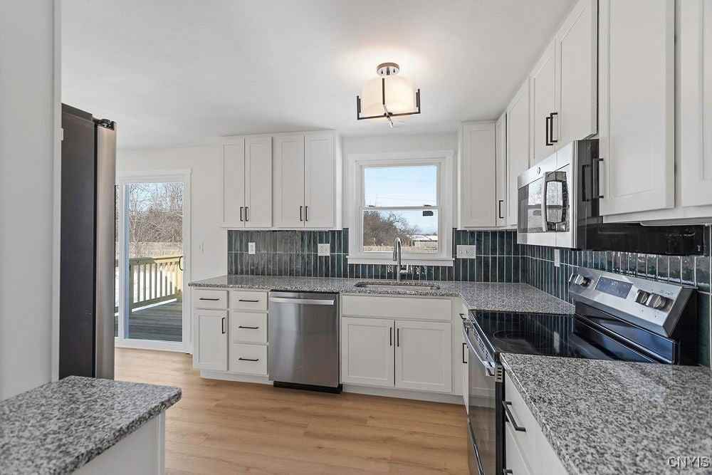 7708 Fitzpatrick Dr - Photo 4 of 23