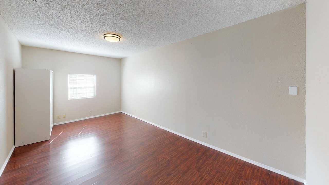 Charming Rue De Lis Home with Vaulted Ceilings & Fireplace - Photo 5 of 20