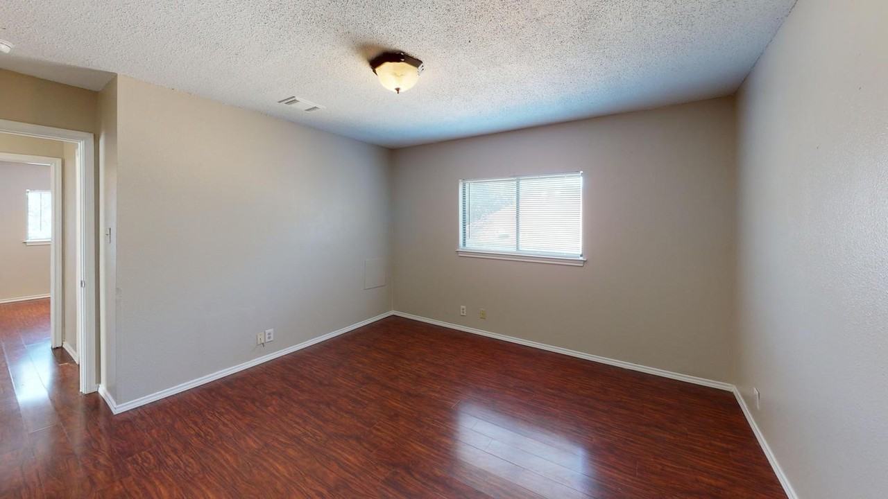 Charming Rue De Lis Home with Vaulted Ceilings & Fireplace - Photo 7 of 20
