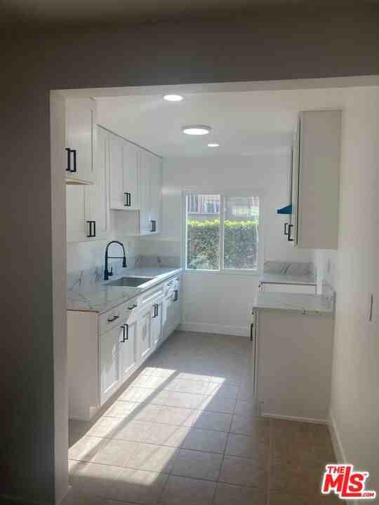 1101 W 106th St #3-3 - Photo 2 of 10