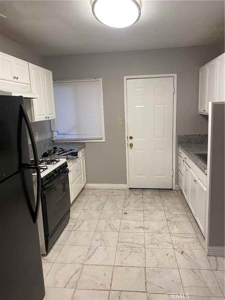 1127 N Wilmington Blvd #1127 - Photo 3 of 3