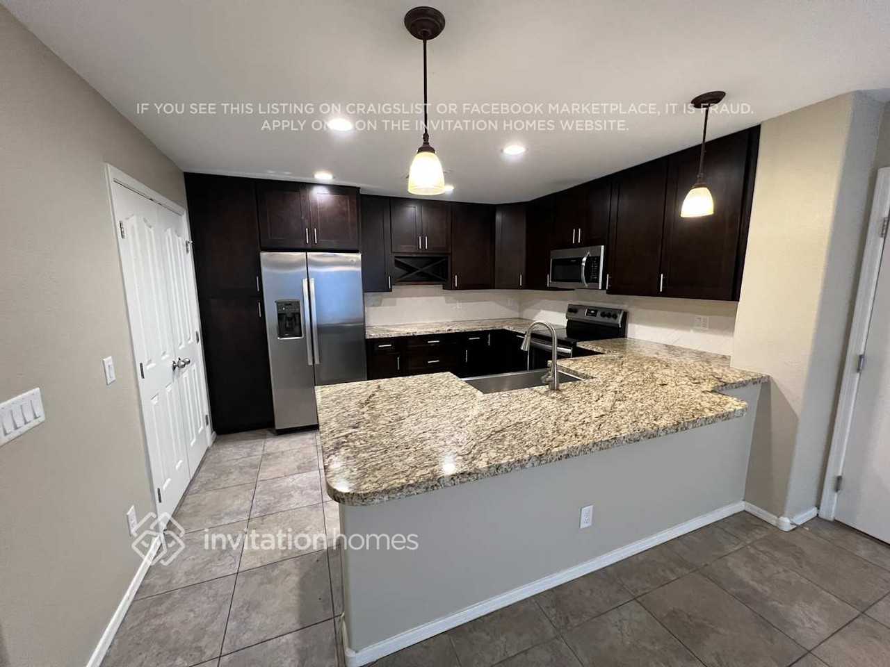 5816 E Harmony Ave - Photo 6 of 16