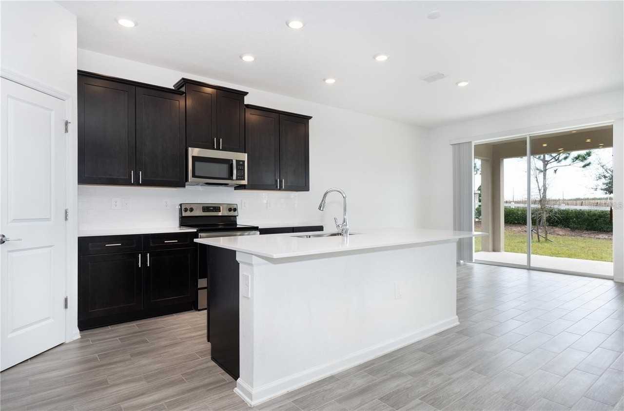 7137 Dilly Lake Ave - Photo 5 of 26