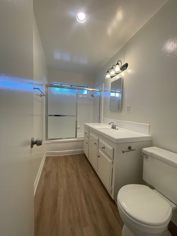 Upstairs 2 Bed 1 Bath, 1 Assigned Parking Space Included, 1.5 Miles From the Beach - Photo 2 of 7