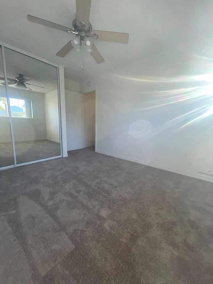 Upstairs 2 Bed 1 Bath, 1 Assigned Parking Space Included, 1.5 Miles From the Beach - Photo 5 of 7