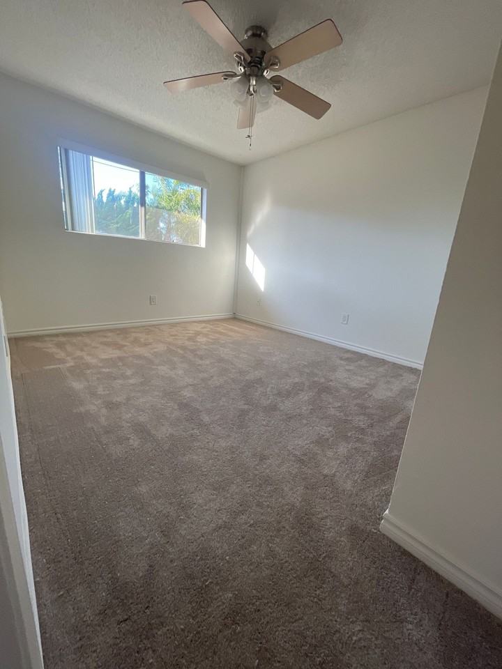 Upstairs 2 Bed 1 Bath, 1 Assigned Parking Space Included, 1.5 Miles From the Beach - Photo 7 of 7