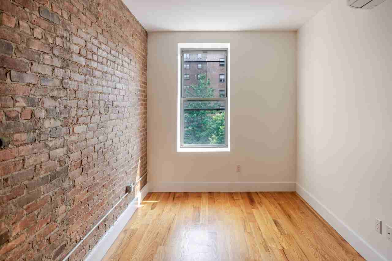 217 East 115th Street - Photo 2 of 6