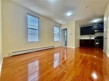 561 61st St #1F - Photo 1 of 4