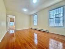 561 61st St #1F - Photo 2 of 4