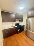 561 61st St #1F - Photo 3 of 4