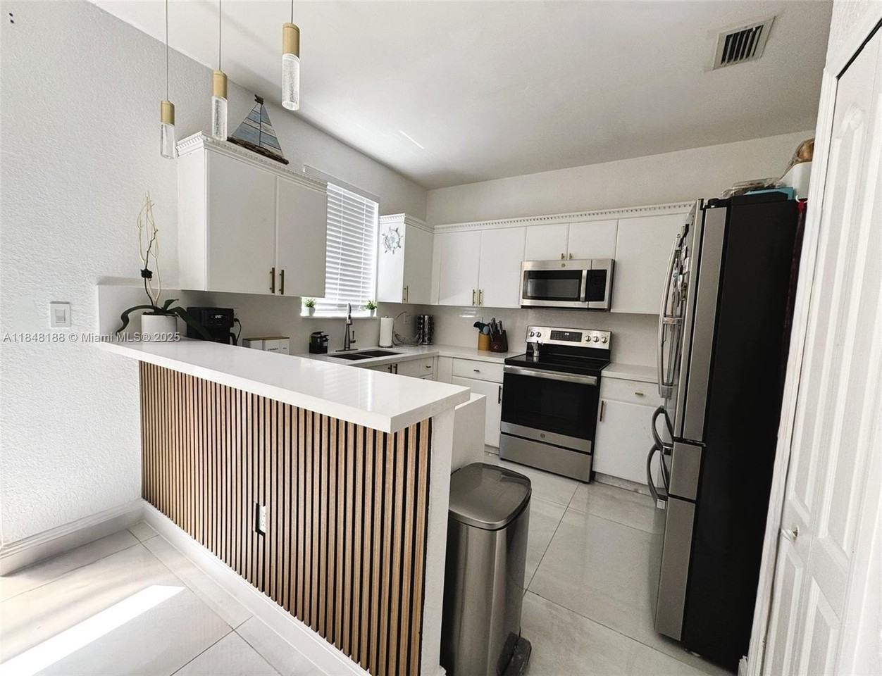 7020 Nw 177th St #B102 - Photo 4 of 20