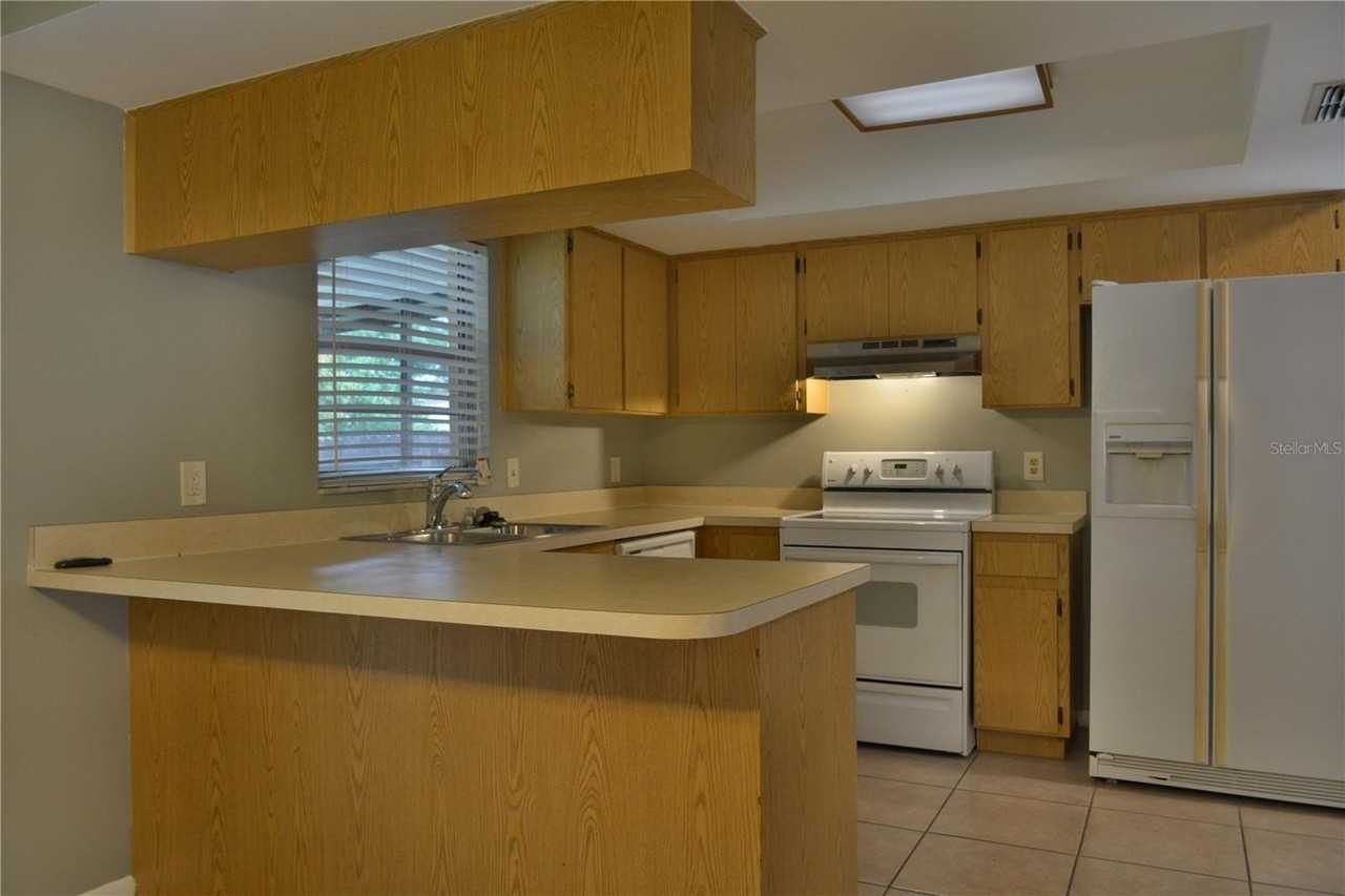 10002 Turkey Trot Pl - Photo 4 of 19