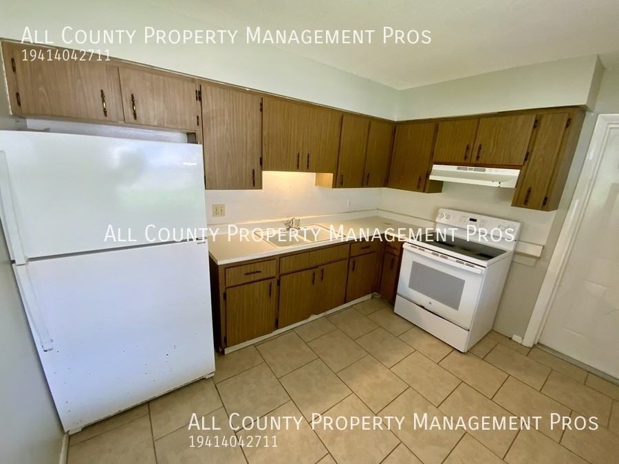 614 20th Ave W - Photo 3 of 12