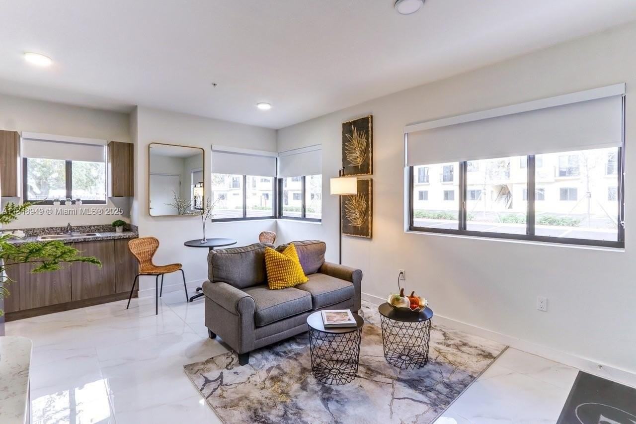 339 W 78th Rd #203 - Photo 4 of 23