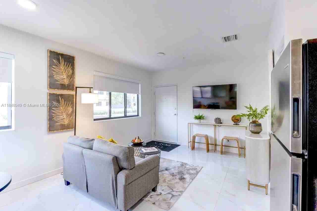 339 W 78th Rd #203 - Photo 6 of 23