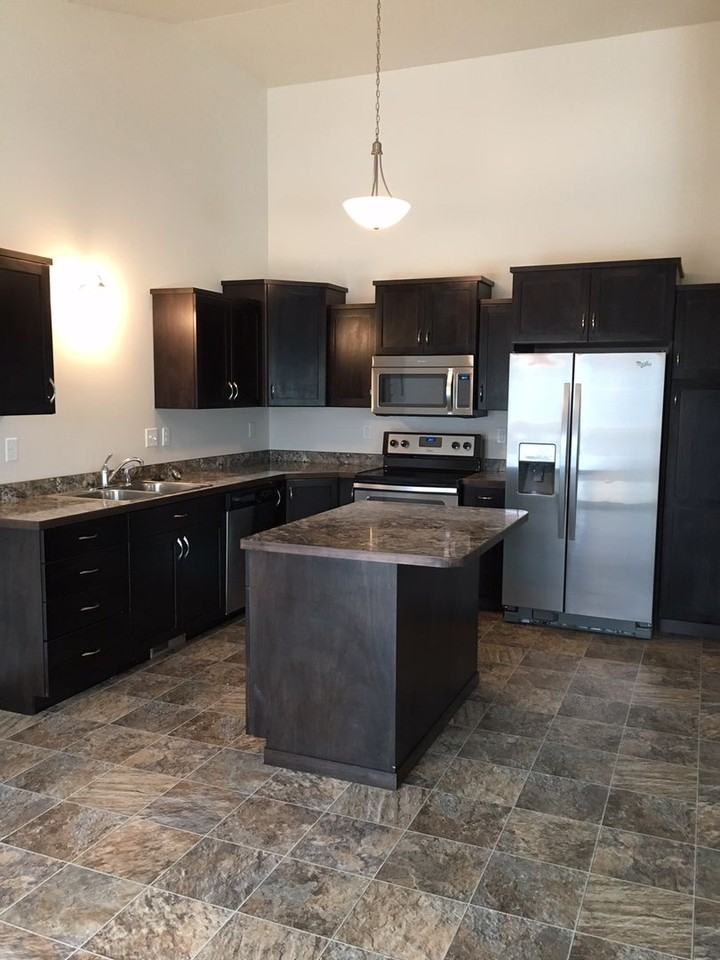 1308 13th St W - Photo 3 of 7