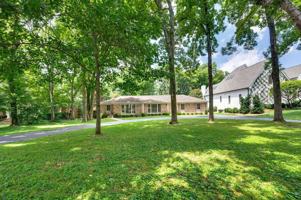 featured image of 703 Woodleigh Dr