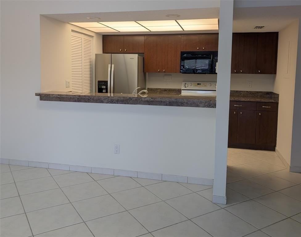 1061 Nw 122nd Ter - Photo 3 of 5