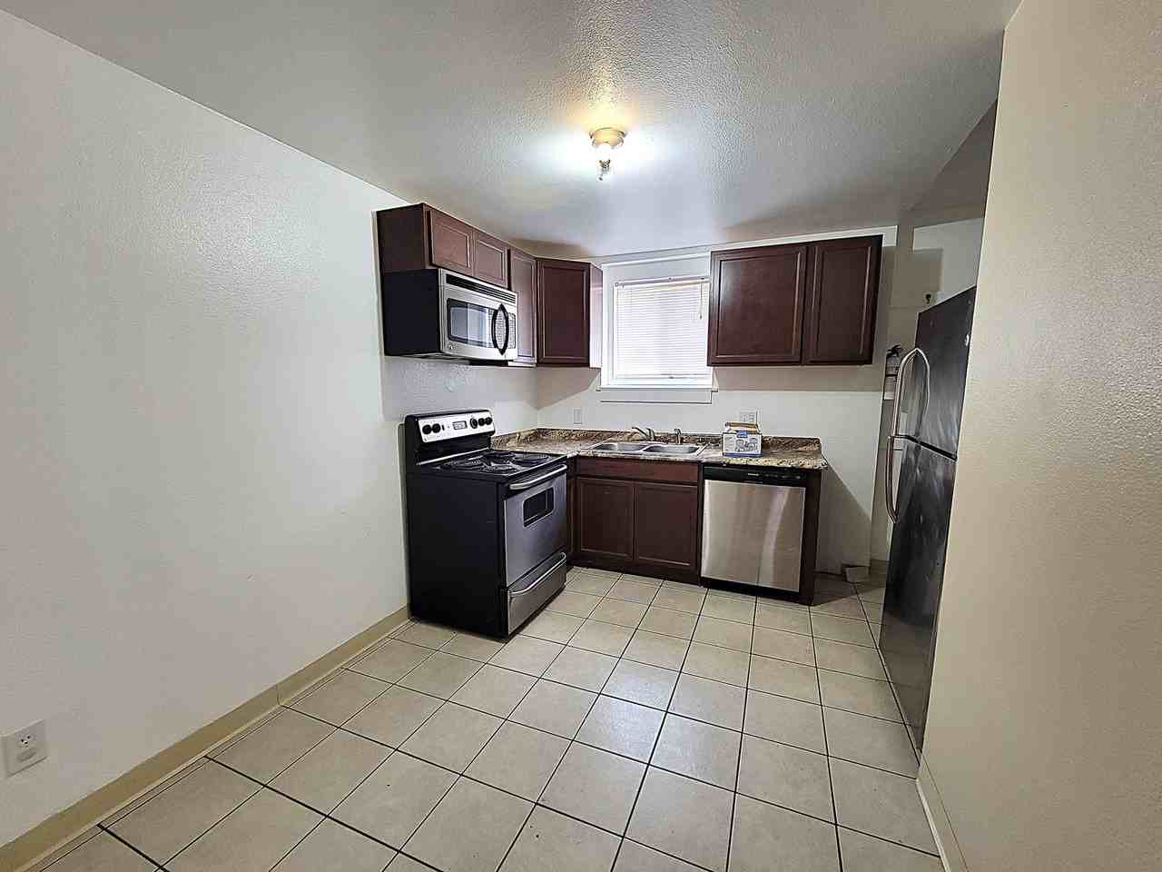 1087-1 Pollock 1110 - 1112 E. 6th ST. - Photo 4 of 26