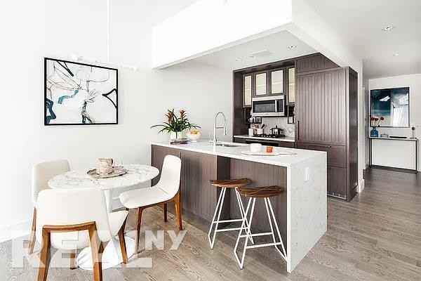 E 14th St #206 - Photo 3 of 7