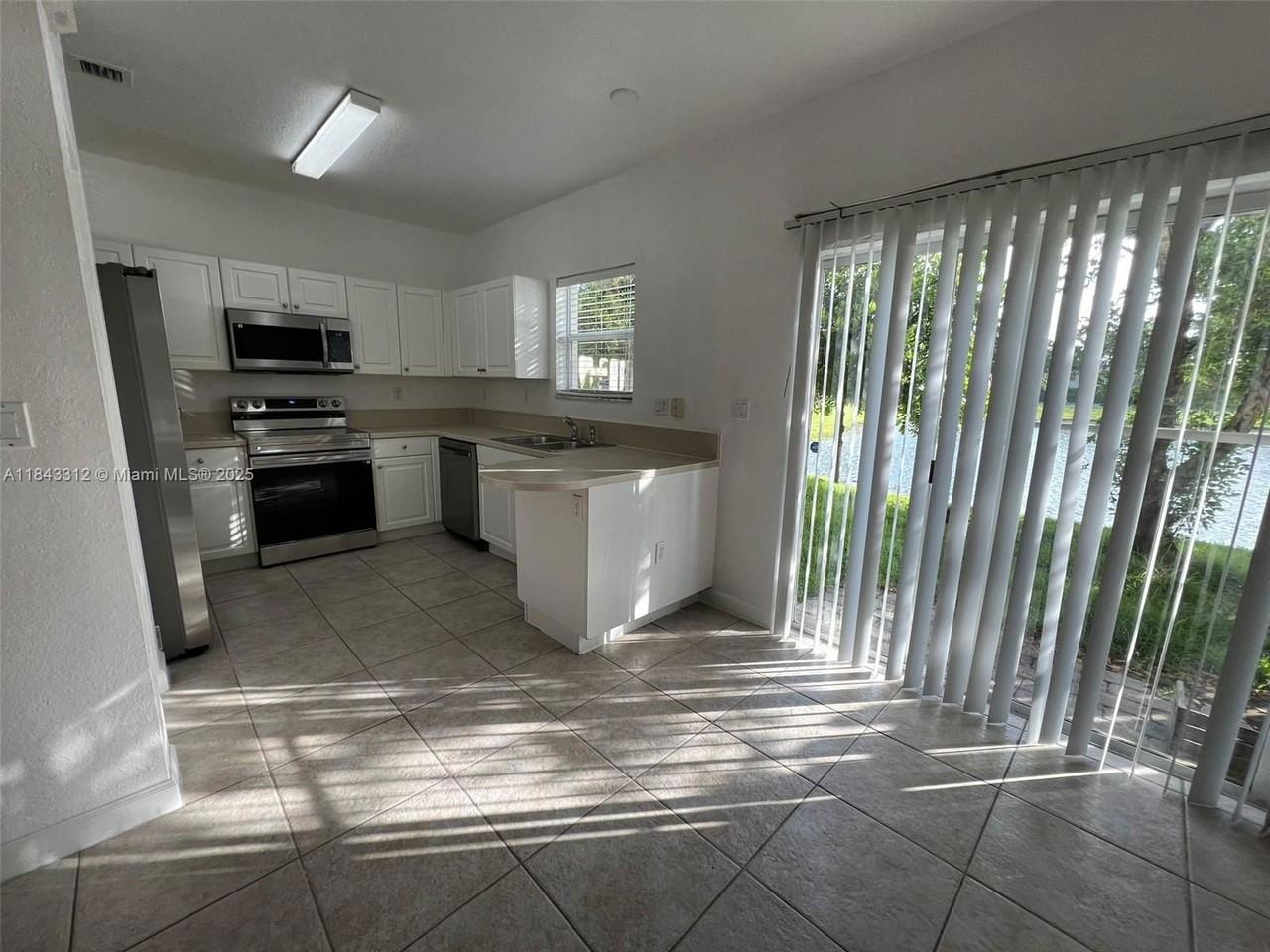 9363 Southwest 219th Street - Photo 3 of 6