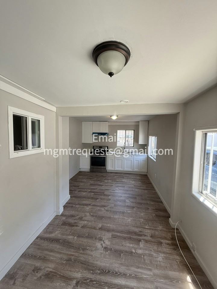 6212 Orchard Ave, Unit 6212 #1/2 - Photo 3 of 11