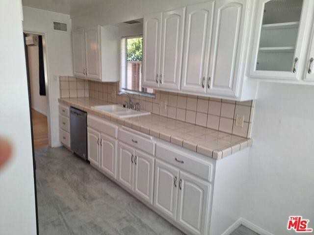 6446 Riggs Pl - Photo 5 of 8