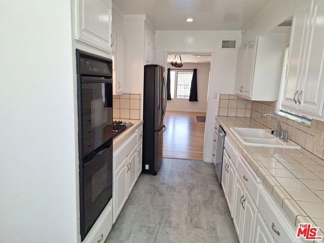 6446 Riggs Pl - Photo 6 of 8