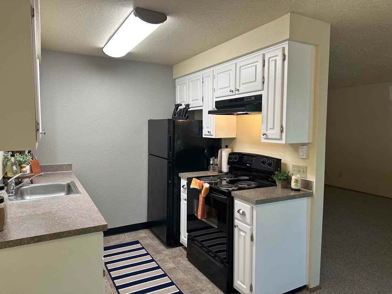 Woodbrook Apartments - Photo 3 of 23