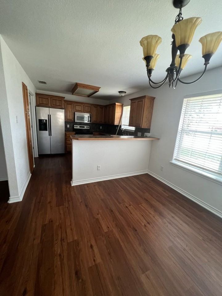 4701 Many Waters Dr - Photo 4 of 14