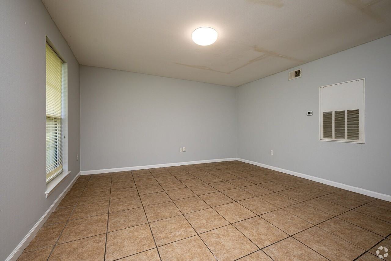 Pine Square Villas - Photo 3 of 7