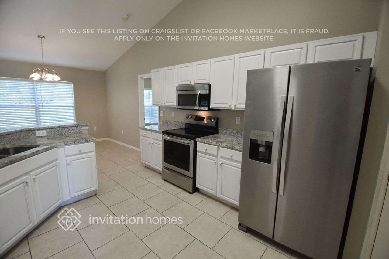 5493 S Chamberlain Blvd - Photo 3 of 11
