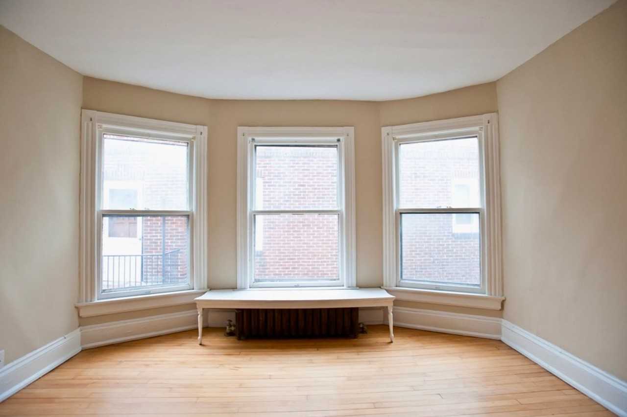 Updated 4BR/2BA in the Water Tower District $2600 – Spacious, Sunny & Steps from Lake Drive - Photo 7 of 21