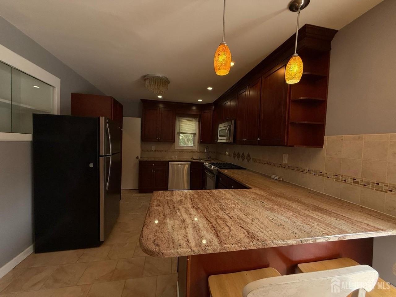 869 Gates Ave - Photo 3 of 27