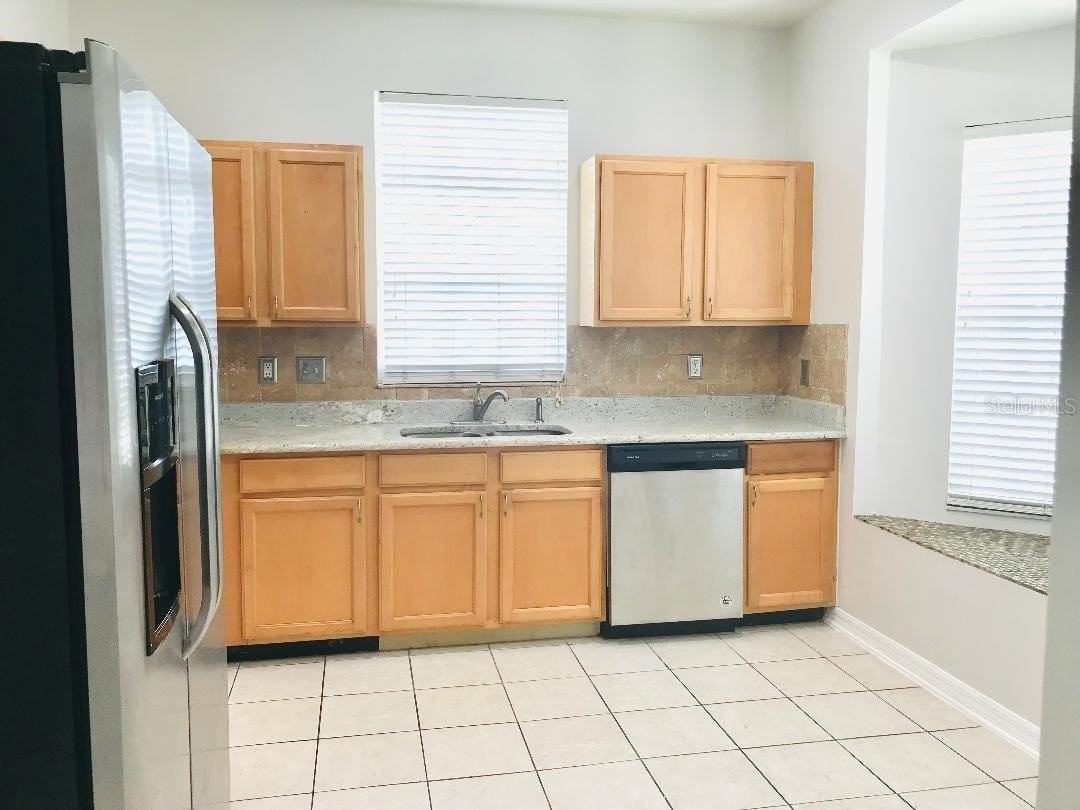 10007 Evanston Pl - Photo 4 of 24