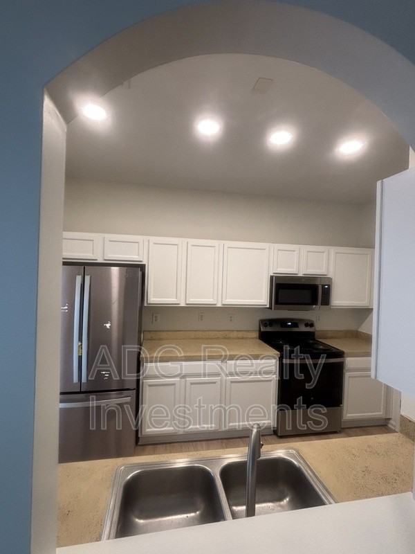 2128 Whispering Way - Photo 3 of 14
